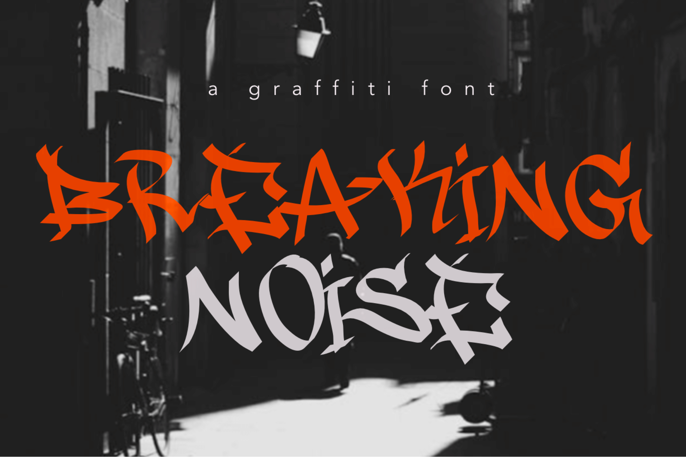 Breaking Noise Font by beadylab, orange rough brush graffiti lettering font preview