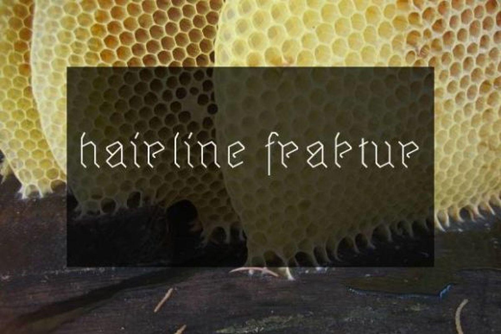 Hairline Fraktur Font preview, fine-line gothic tattoo font
