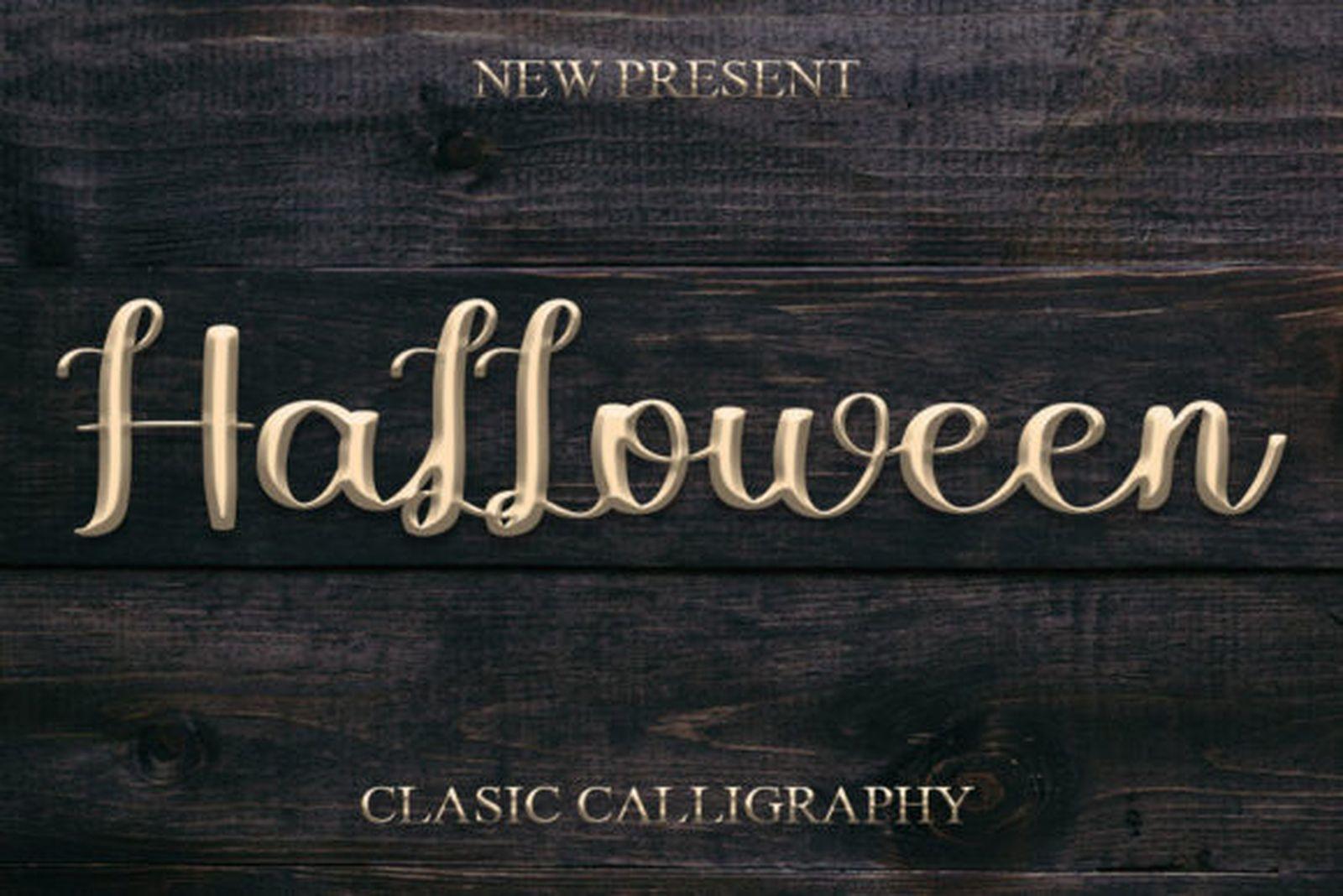 Halloween Font by FreshTypeINK, classic calligraphy script in gold letters on dark wood