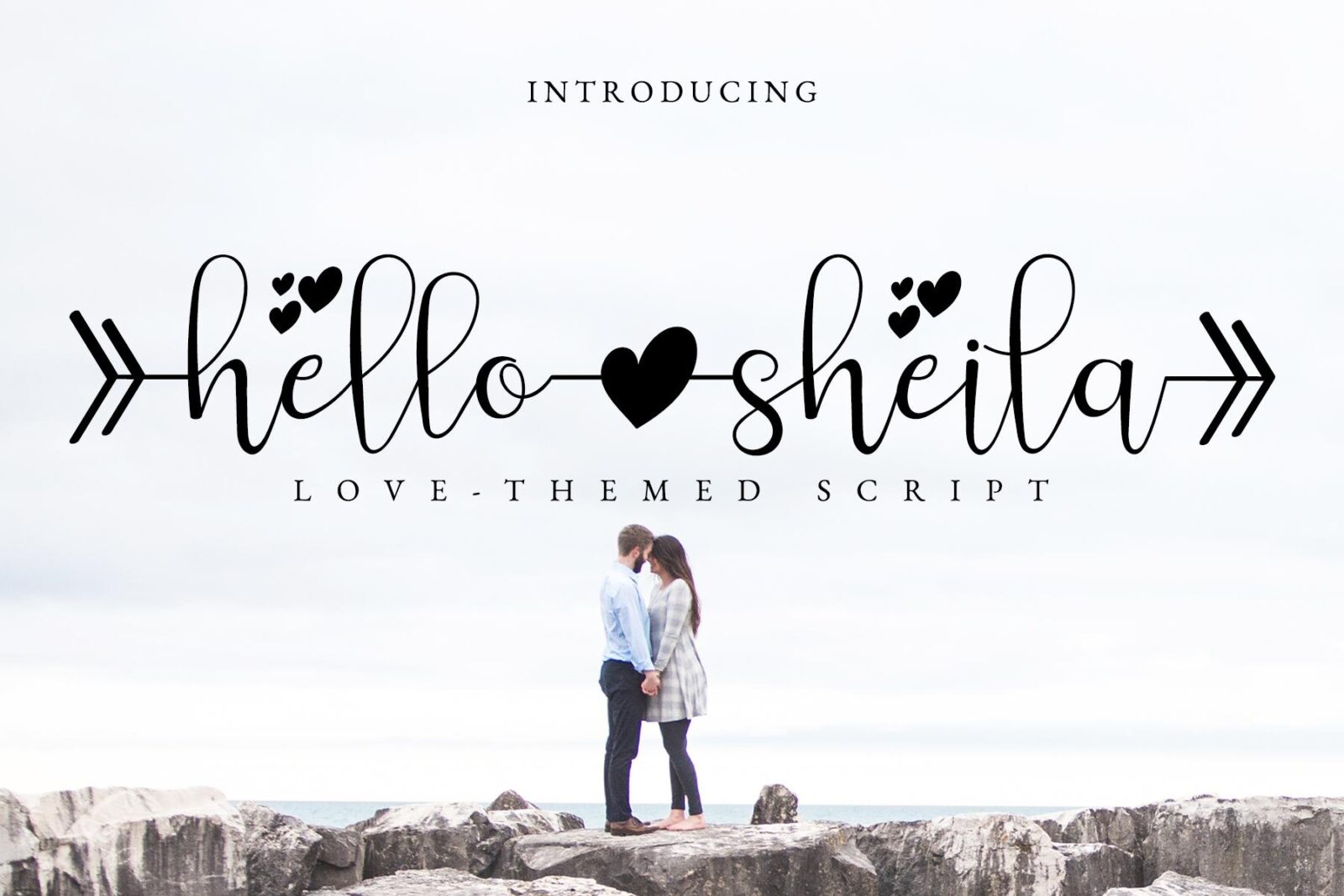 Hello Sheila Font by airotype, love-themed script with hearts and arrow ends font preview