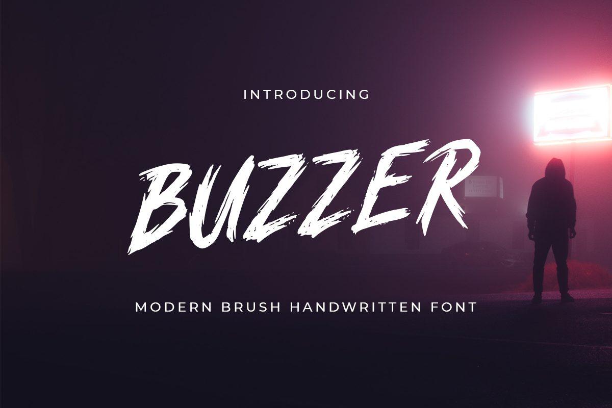 Buzzer Font by sensatype, slanted white brush capitals on dark photo