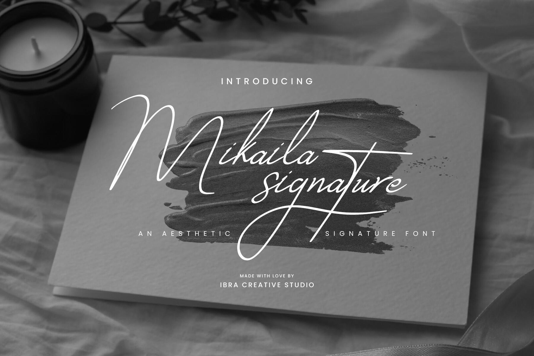 Mikaila Signature Font by ibracreative, white signature script over a dark candle photo