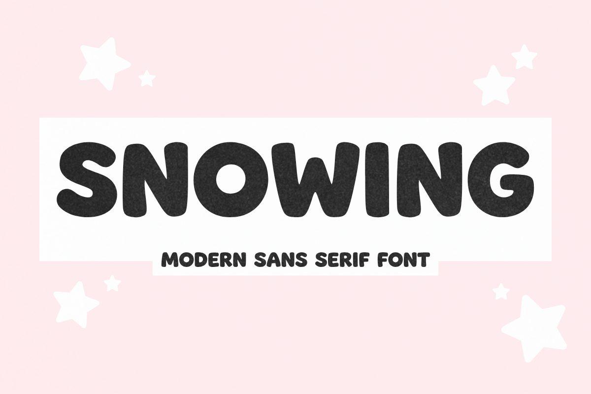 Snowing Font by Minimalist Eyes, heavy capitals on a white label over pink with white stars