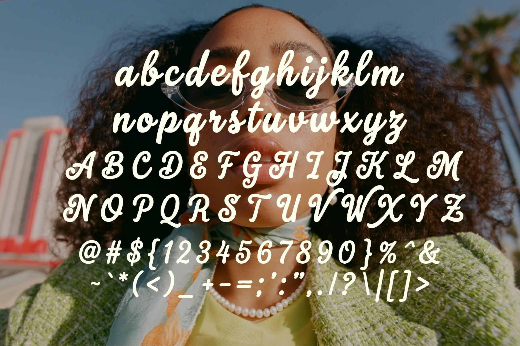 Sunkissed Sunday Font by HipFonts alphabet, heavy retro script in white over a photo