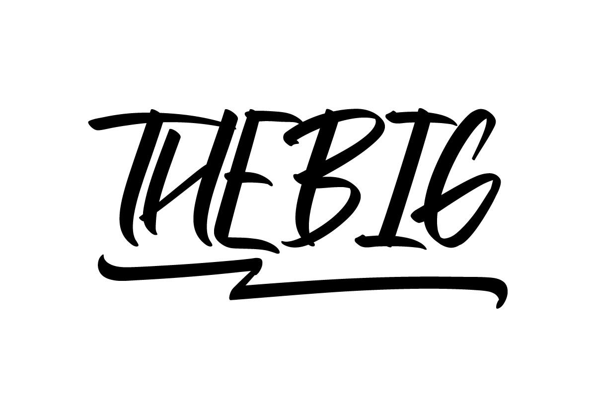 The Big Font by NihStudio, heavy slanted condensed brush capitals with rough edges and an underline swash